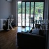 Modern holiday apartment in Przno, 75 m2, with a garage, with a sea view and a swimming pool, Budva Municipality, Montenegro.