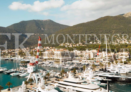 Luxury waterfront two-bedroom apartment, 148 m2, with a sea view, swimming pool and garage, in the harbor Porto Montenegro in Tivat, Montenegro.