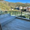 Ideal für dauerhaften Wohnsitz und Ferienwohnung, 58m2, in Montenegro, an der Budva Riviera, Bečići, 3 Minuten zu Fuß zum Meer, inklusive einer Garage.