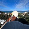 Здание апартаментов с квартирами для отдыха / небольшой отель в Утjеха-Хладна Увала, всего в 280 метрах от моря, в Черногории.